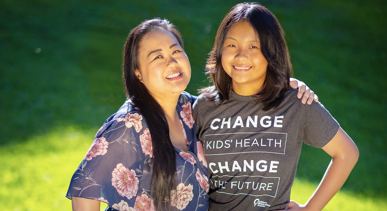 Pediatric surgery patient Annabelle with her mom Ka Yang