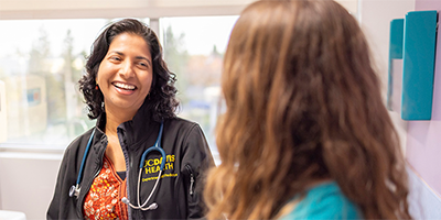 Doctor smiles at patient (c) UC Davis Regents. All rights reserved.