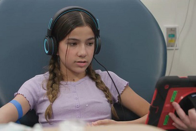 Girl looks at iPad