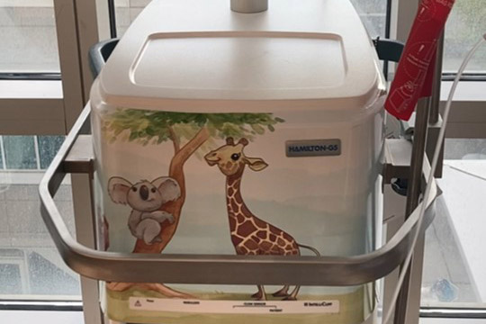 Ventilator with a decorative wrap.
