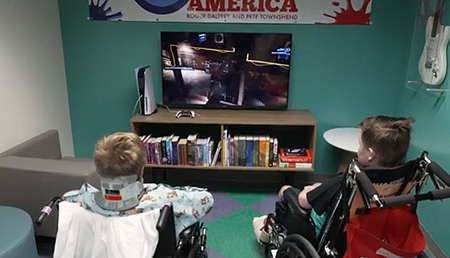 Teens playing video games.
