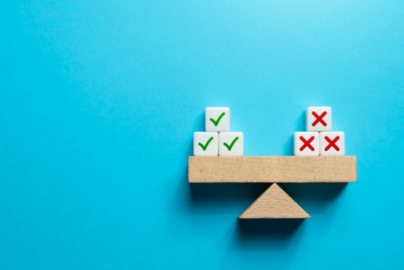 Blocks balanced on two sides of a scale.