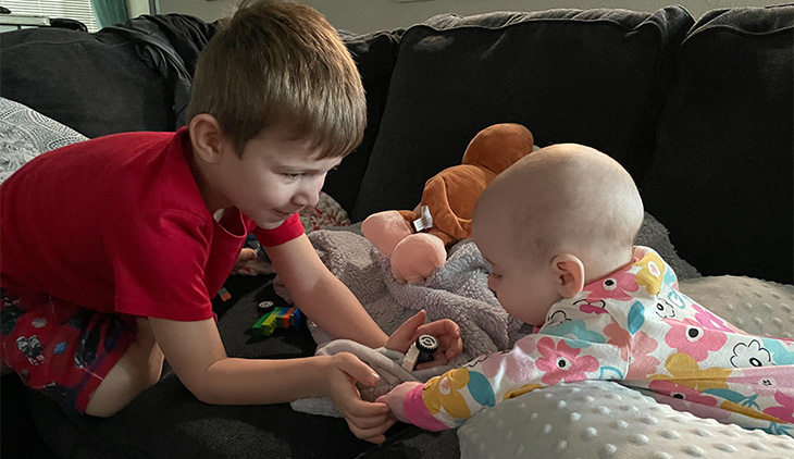 Everett playing with Ellie