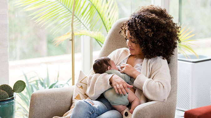 mom breastfeeding her baby