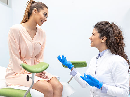 woman patient talking to physician
