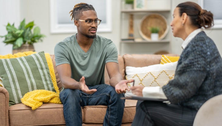 Man in therapy session