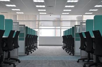 desks and chairs in office