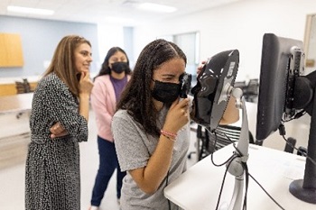 students practicing eye exam