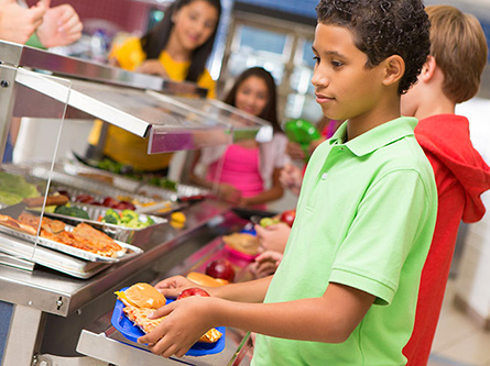 Kids waiting in line at school cafeteria