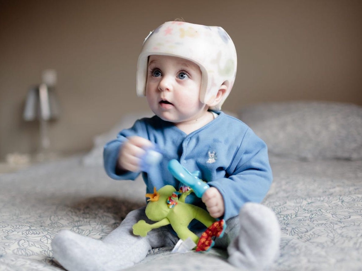 baby wearing helmet