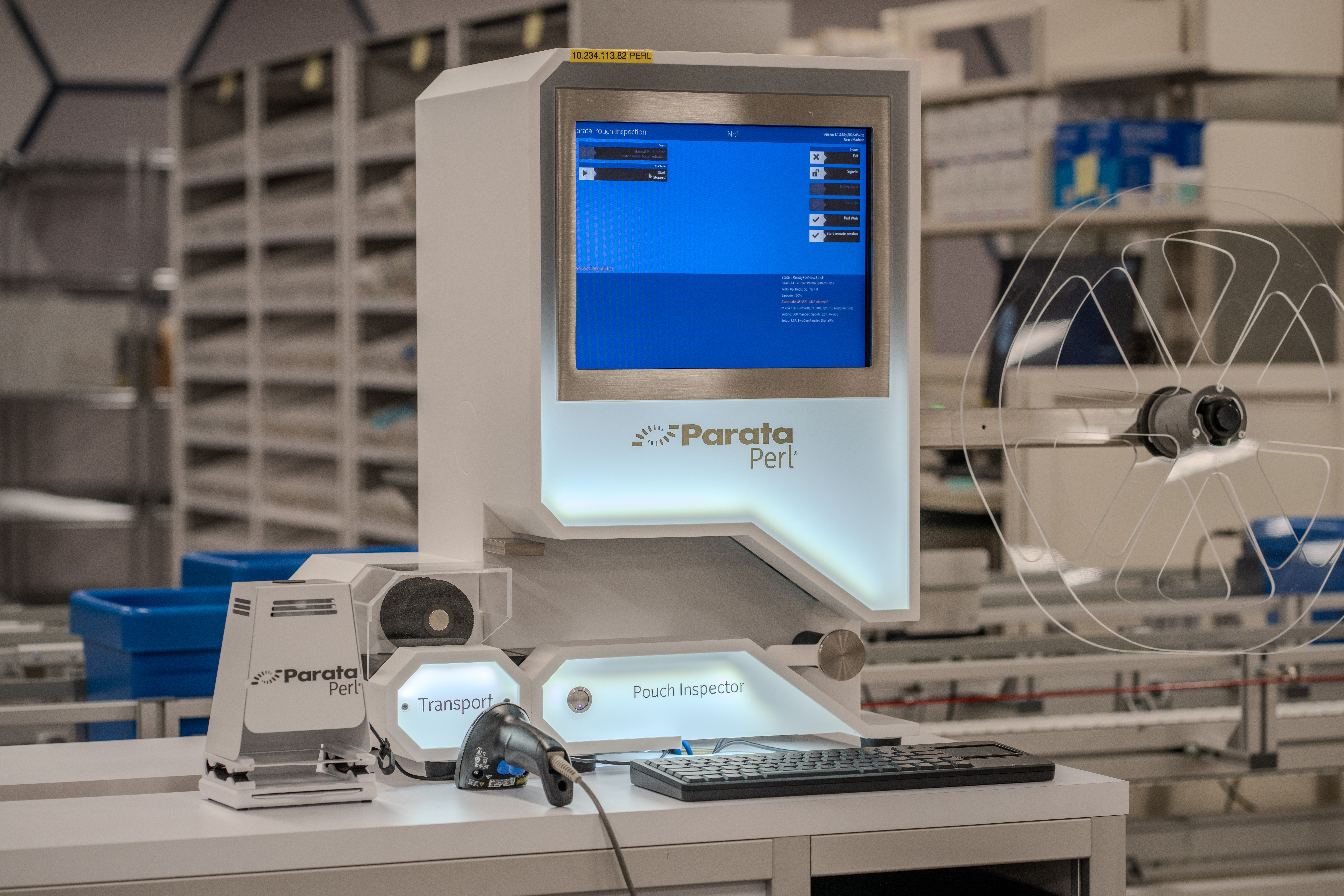 Parata Perl transport and pouch inspector machine