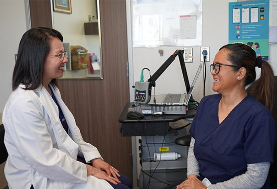 Doctor smiling with neurology patient