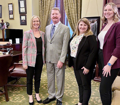 Sheridan Miyamoto, left, meets with Pennsylvania Sen. Elder Vogel, center,  who sponsored the bill that became Act 59 in 2023, expanding access to trained forensic nurses across the state. (c) All rights reserved.