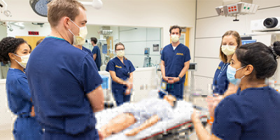Emergency medicine participates in training simulations. (C) UC Davis Regents. All rights reserved. 