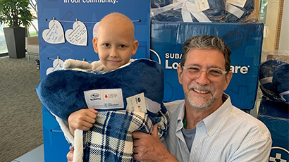Heart-shaped pillow blankets warm hearts of childhood cancer patients