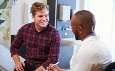 Man at a doctor's appointment (c) UC Regents. All rights reserved.